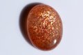Слънчев камък конфети 11.6ct овален кабошон #6