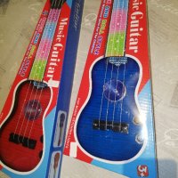 детска китара с струни и батерии. , снимка 2 - Музикални играчки - 43523986
