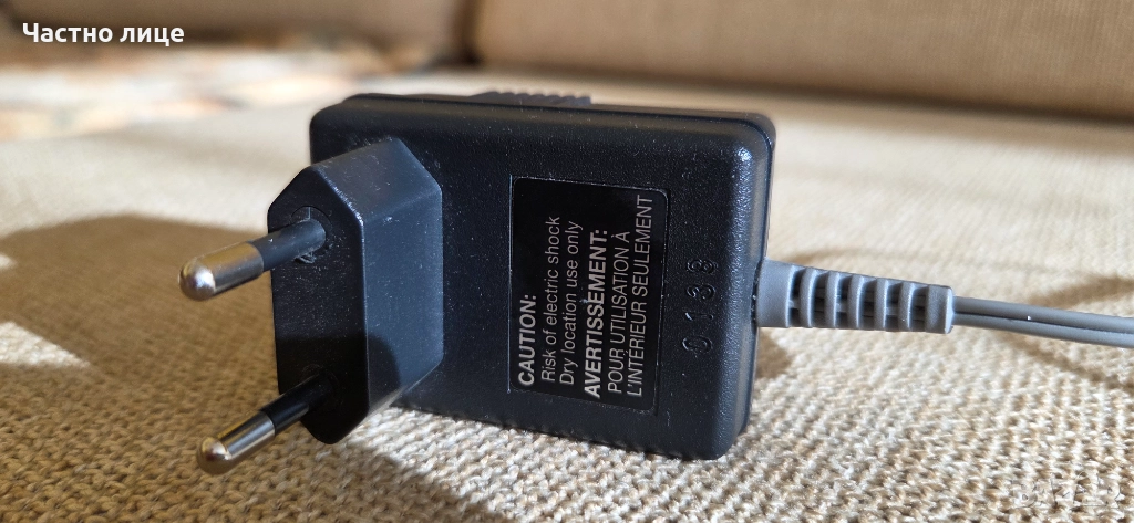 Продавам захранващ адаптер 15V., снимка 1