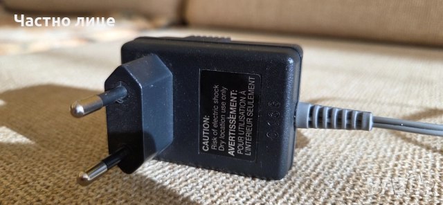 Продавам захранващ адаптер 15V.