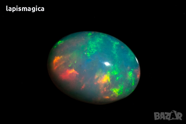 Етиопски опал 1.02ct 9x7mm овален кабошон, снимка 2 - Други - 52137384