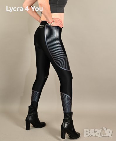 Nike Dri-fit страхотен черен дамски клин с преливащи сребристи ивици S/M размер, снимка 2 - Клинове - 39856417