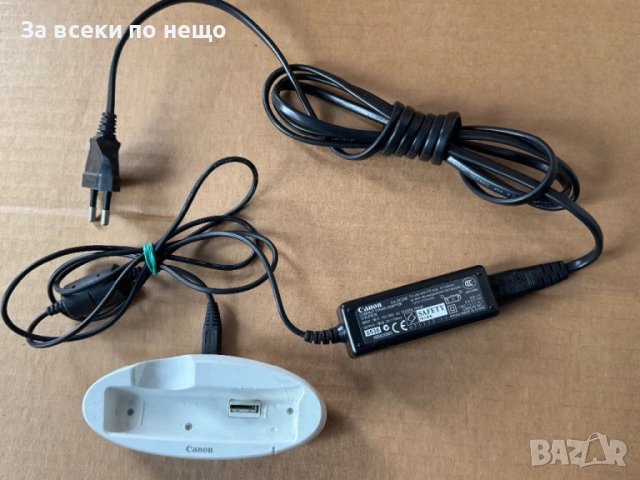 Оригинално зарядно за цифров фотоапарат ,  Canon CA-DC20E