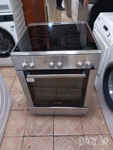 Иноксова свободно стояща печка с керамичен плот Бош Bosch с две години гаранция!