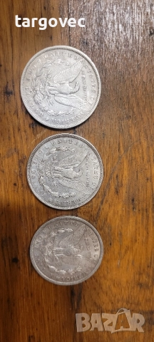 три броя сребърни американски долари по 150 лв