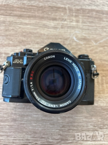 Canon A-1 с обектив Canon lens fd 50mm 1:1,4 S.S.C, снимка 8 - Фотоапарати - 52062393