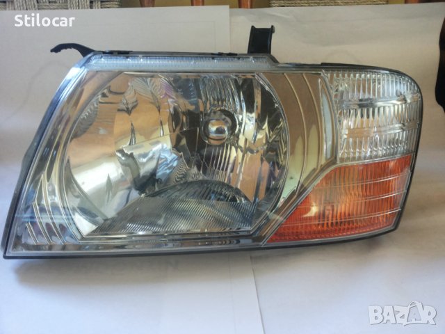 Фар Мitsubishi Padgero 03-06г ел.ляв