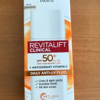 Дневен флуид за лице L'oreal Revitalift Clinical с SPF50+, снимка 1 - Козметика за лице - 43757437