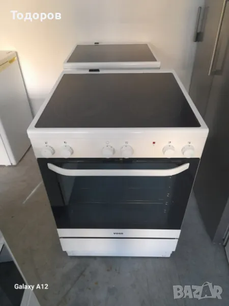 Готварска печка с керамичен плот и фурна с вентилатор Voss Electrolux, снимка 1