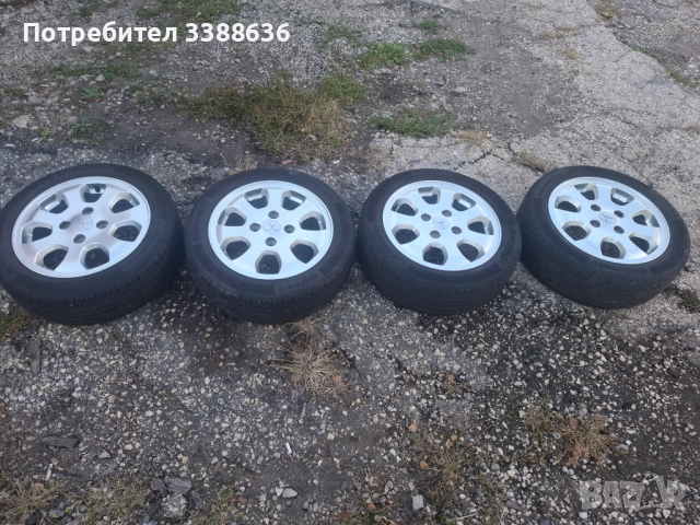 4 бр. Оригинални алуминиеви джанти 15инча за Митсубиши Колт, Лансер 2007до2012г.