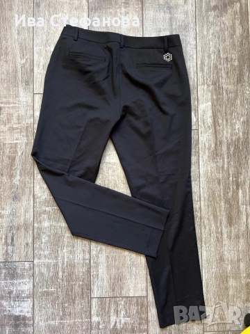Нов оригинален спортно елегантен черен панталон Puma Пума , снимка 2 - Панталони - 51607829