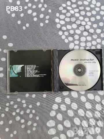 Music Instructor - Electric City CD, снимка 4 - CD дискове - 51316495