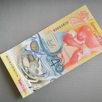 Банкнота - Източни Кариби - 2 долара (юбилейна) UNC | 2023г., снимка 1 - Нумизматика и бонистика - 44924004