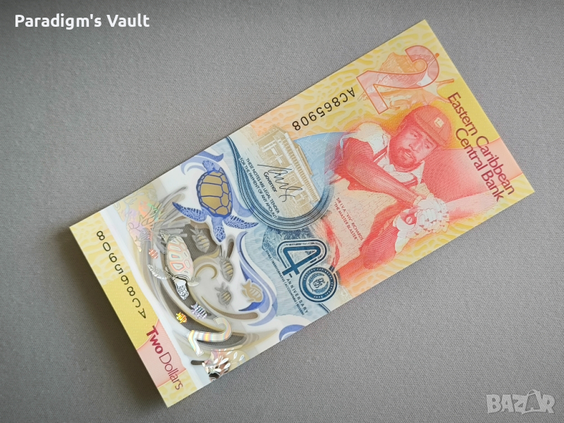 Банкнота - Източни Кариби - 2 долара (юбилейна) UNC | 2023г., снимка 1
