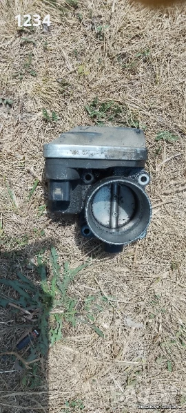 Дроселова клапа за голф 4 1.6 бензин, снимка 1