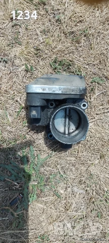 Дроселова клапа за голф 4 1.6 бензин