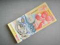 Банкнота - Източни Кариби - 2 долара (юбилейна) UNC | 2023г., снимка 1 - Нумизматика и бонистика - 44924004