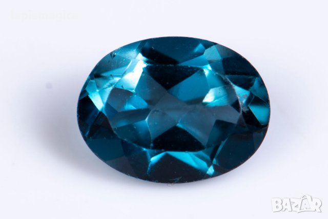 Син топаз лондонско синьо 1.50ct VS овална шлифовка #1
