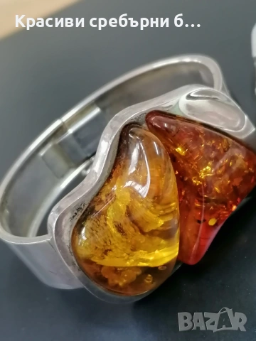  Твърда сребърна гривна с балтийски кухлибар. 