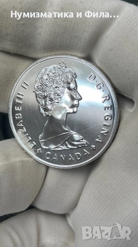 Сребърна монета Канада 1 долар 1985 година, снимка 2 - Нумизматика и бонистика - 52705061