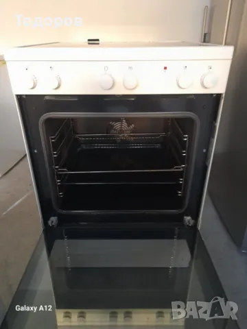 Готварска печка с керамичен плот и фурна с вентилатор Voss Electrolux, снимка 2 - Печки, фурни - 48115151