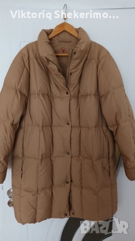 Шуба с пълнеж от естествен пух.