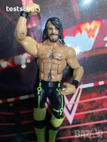 Екшън фигура WWE Seth Rollins Сет Ролинс Mattel Elite figure играчка neon yellow & black, снимка 12 - Колекции - 49152214