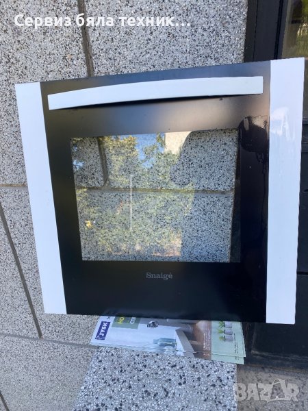 Продавам перфектно предно стъкло с дръжката за вратата на готварска печка Snaigе (VOLTEL), снимка 1