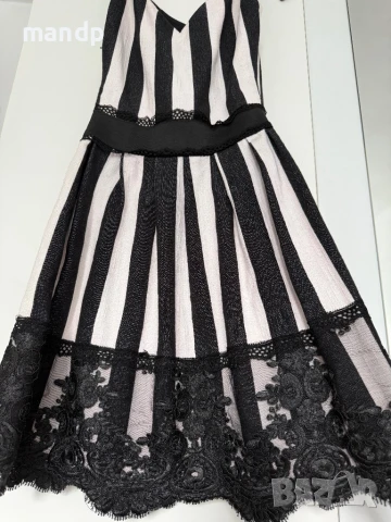 Елегантна черно-бяла рокля