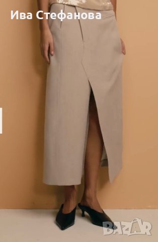 Пола бежова асиметричен акцент  със свободна кройка от елегантна материя с деликатен меланжов десен., снимка 9 - Поли - 44132936