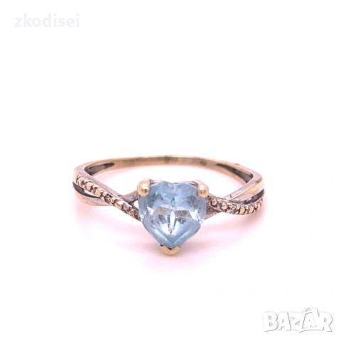 Златен дамски пръстен с топаз и диамант 1,30гр. размер:51 14кр. проба:585 модел:18934-1