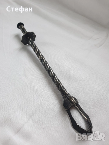 Посребрена щипка за лед 