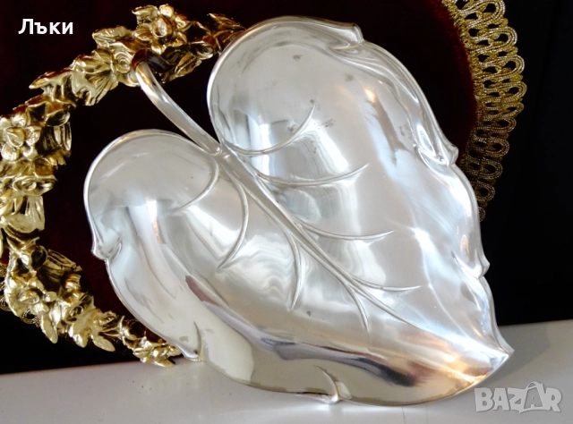 Посребрена фруктиера Листо на Hoka Germany. 