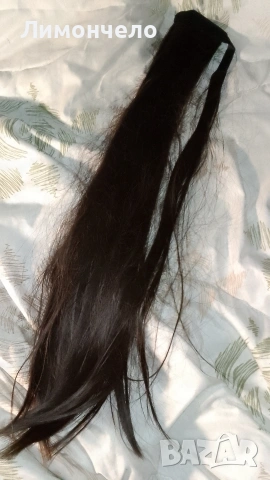 Маркова дълга кафява опашка на Haircub 