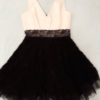 Богата уникална черно и бяло стилна рокля къса с много богата долна част, елегантна ,скъпа материя, снимка 4 - Рокли - 37258618