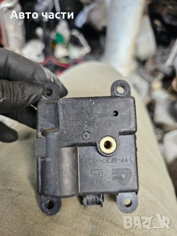 Nissan PRIMERA 2K001 30850 Задвижващ механизъм за вентилация на клапата на парното