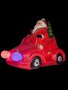 Коледна декорация Дядо Коледа с червена кола и светещи фарове