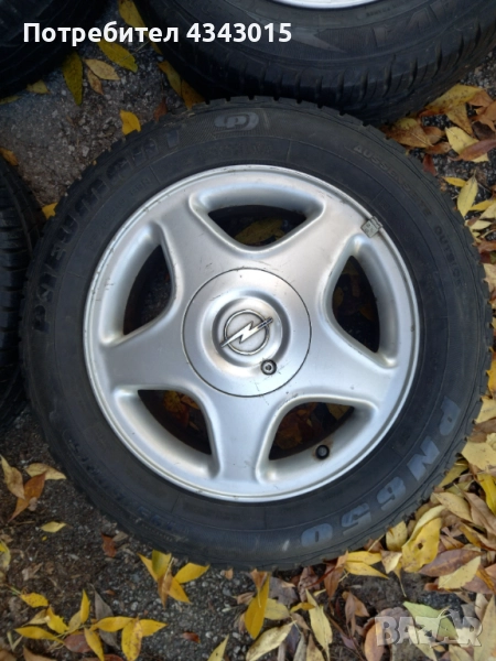 4 броя гуми с гуми , снимка 1