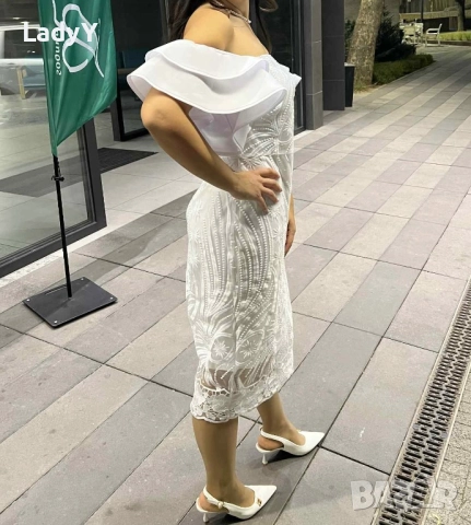 Елегантна бяла рокля