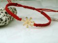 Златна фигура РОЗЕТАТА ОТ ПЛИСКА в гривна червен конец, снимка 1