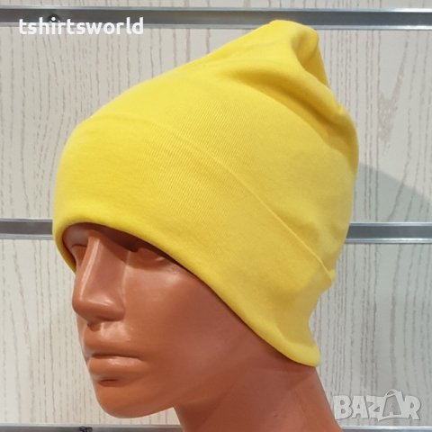 Нова дамска зимна шапка с подгъв в жълт цвят, снимка 1 - Шапки - 39325351