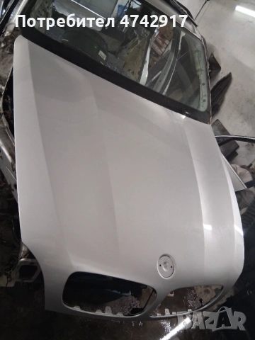 Преден капак бмв х5 е70, снимка 3 - Части - 53582802