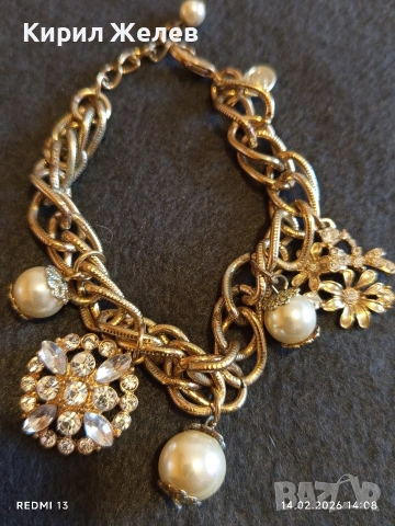 Ефектна гривна инкрустирана с блестящи кристали флорален мотив 12639