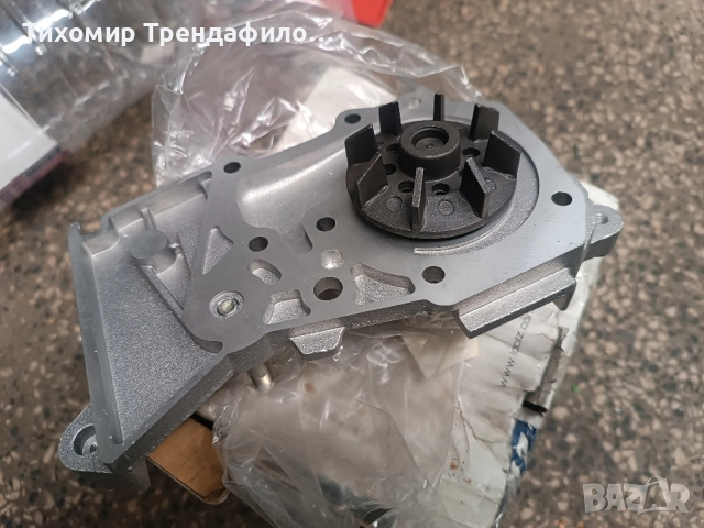 Нова водна помпа за меган 1.6 бензин DOLZ R216, снимка 5 - Части - 50002243