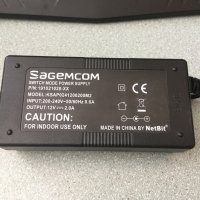 Зарядно Sagemcom 12V 2.0A, снимка 2 - Захранвания и кутии - 36831676
