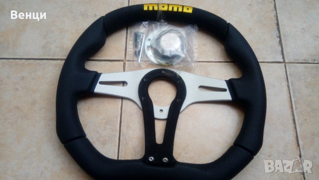    Оригинален спортен волан MOMO Trek TRK 35B K0B 350 мм. естествена кожа., снимка 3 - Аксесоари и консумативи - 35650318