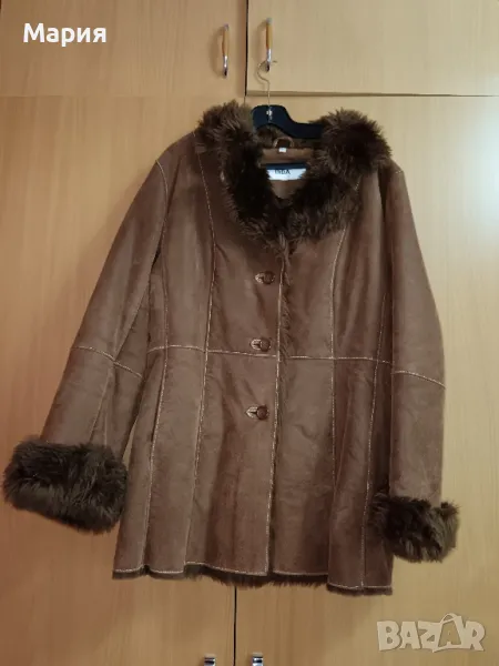 Продавам нов дамски кожух от естествена кожа , снимка 1