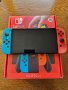 Nintendo Switch OLED - Neon Red & Neon Blue

