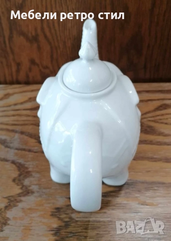 Чайник от бял порцелан, изработен във формата на щастливо слонче с вдигнат хобот и релефни детайли. , снимка 7 - Декорация за дома - 52007567