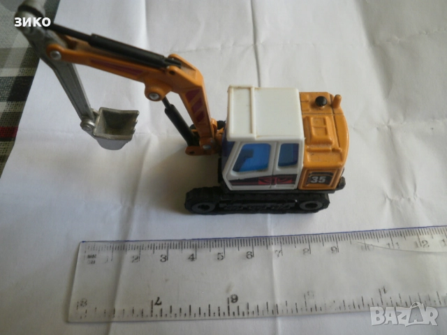 Welly - макет на метално багерче- мащаб 1:34, снимка 2 - Коли, камиони, мотори, писти - 52025444